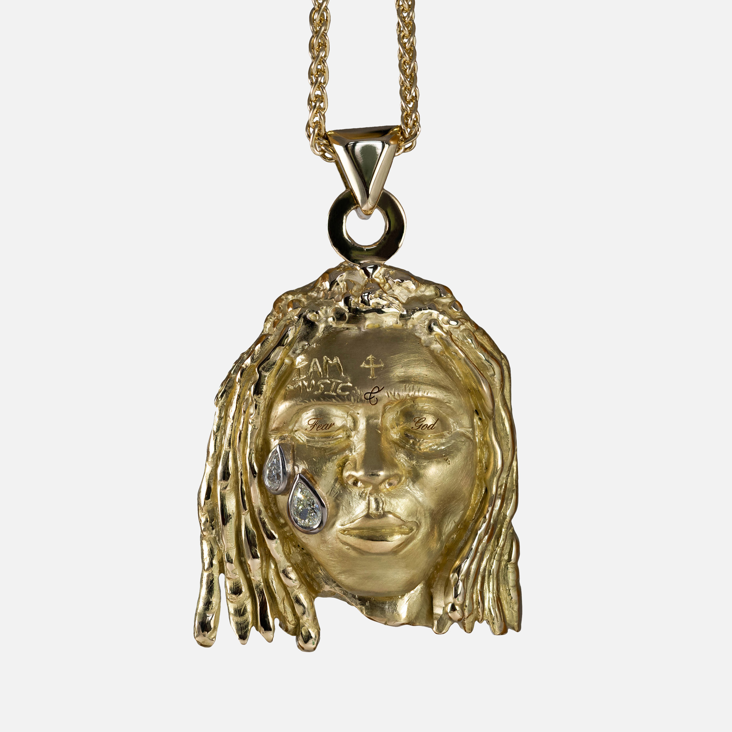 Joy BC pays off university fees with hand-carved pendant of Lil Wayne