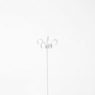 Nendo uses Sèvres porcelain to make flowers from handles and a lilypad table