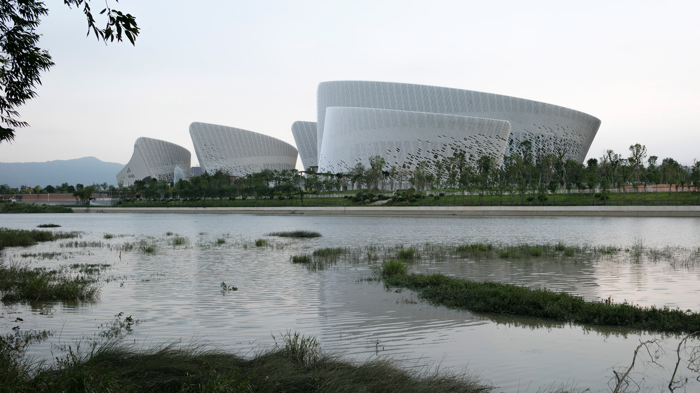 PES Architects reveals petal-shaped Strait Culture and Art Centre in Fuzhou