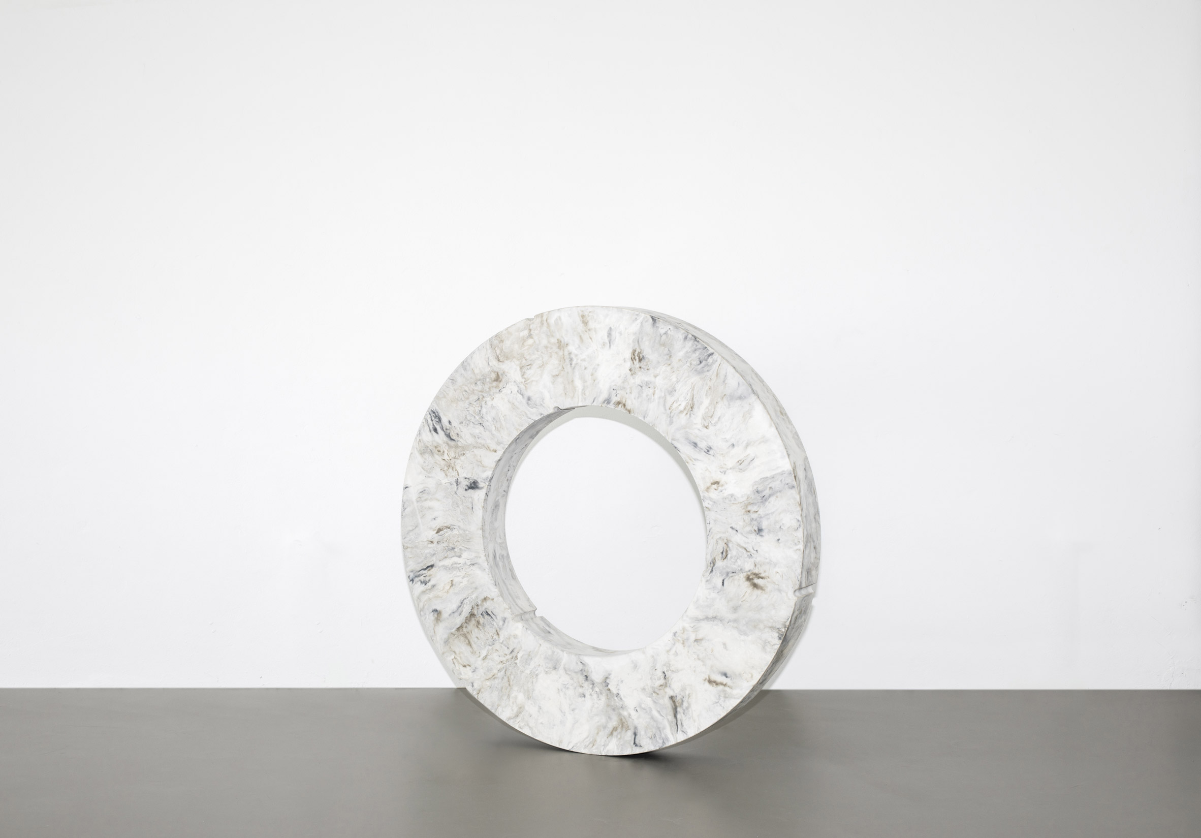 Pigmented concrete emulates sculptural stone in Gestalt furniture by Sment
