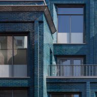 Iridescent turquoise bricks front Damien Hirst's new studio by Stiff + Trevillion