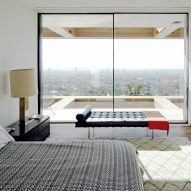 Sliding full-height windows give LA home far-reaching views