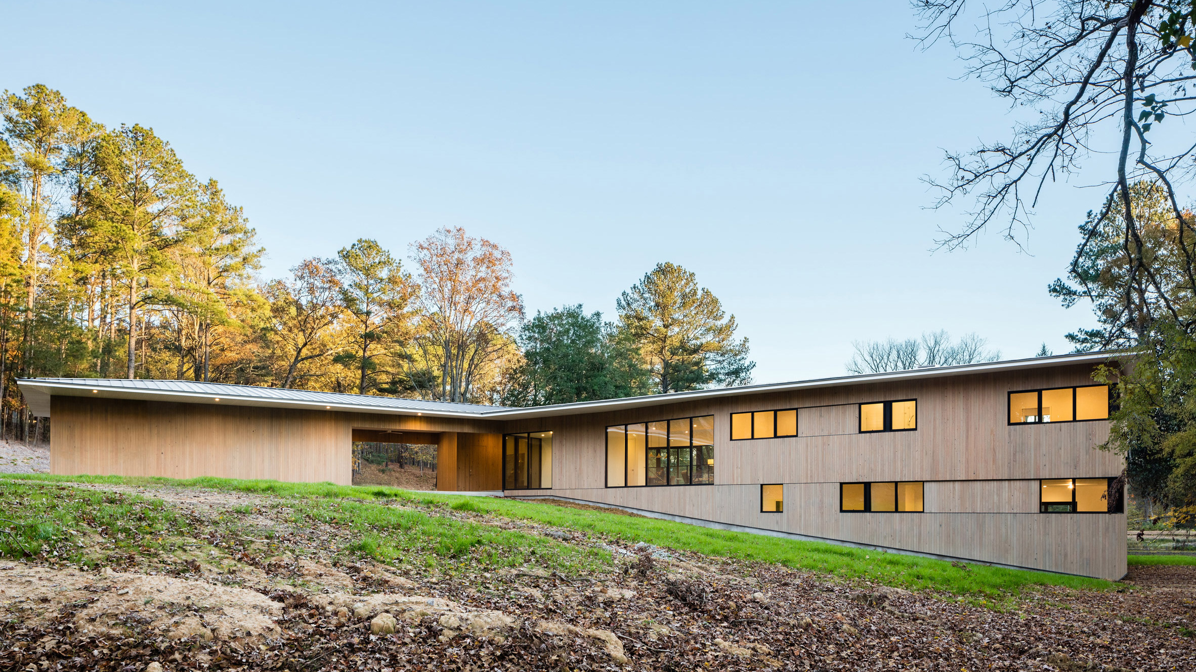 Smitharc Architects situates Blue Dog Residence on wooded property in North Carolina