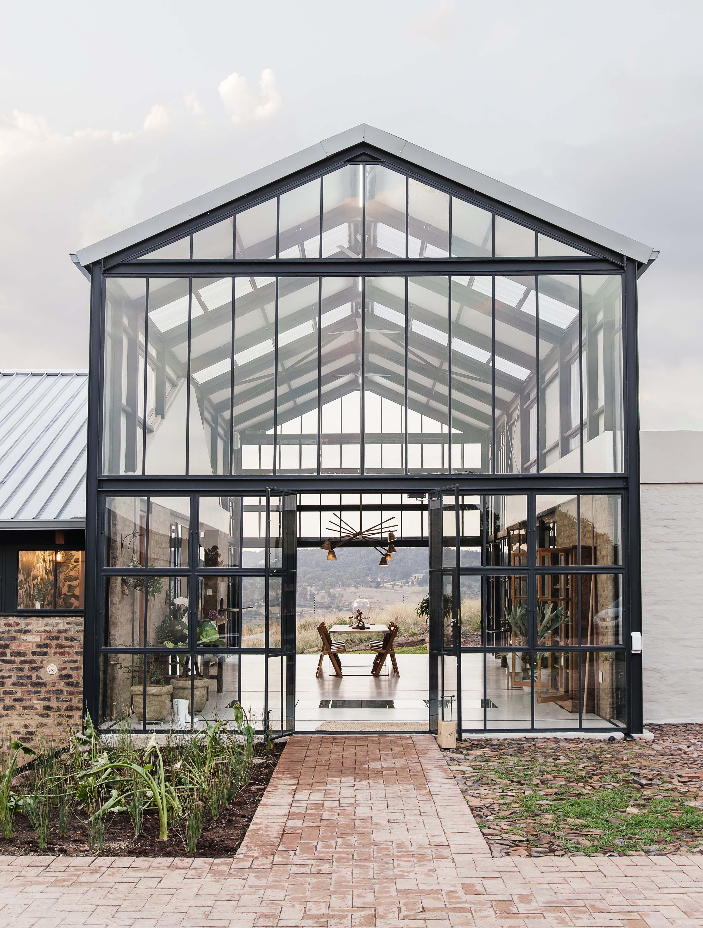 Barn-inspired Conservatory House is an off-grid escape on a Pretoria farm