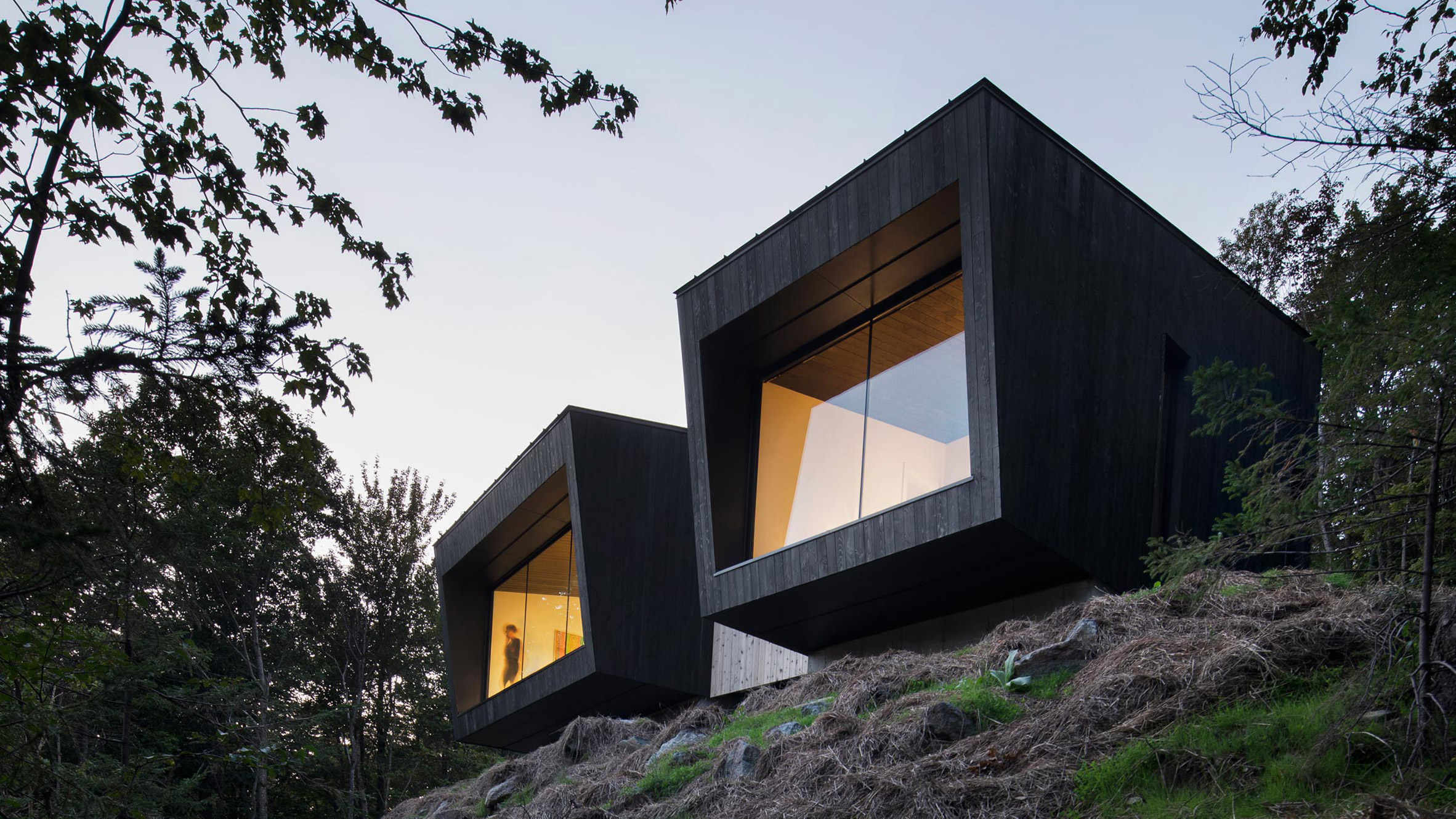 Blackened Wood Cabins Form Minimal Quebec Chalet By Naturehumaine