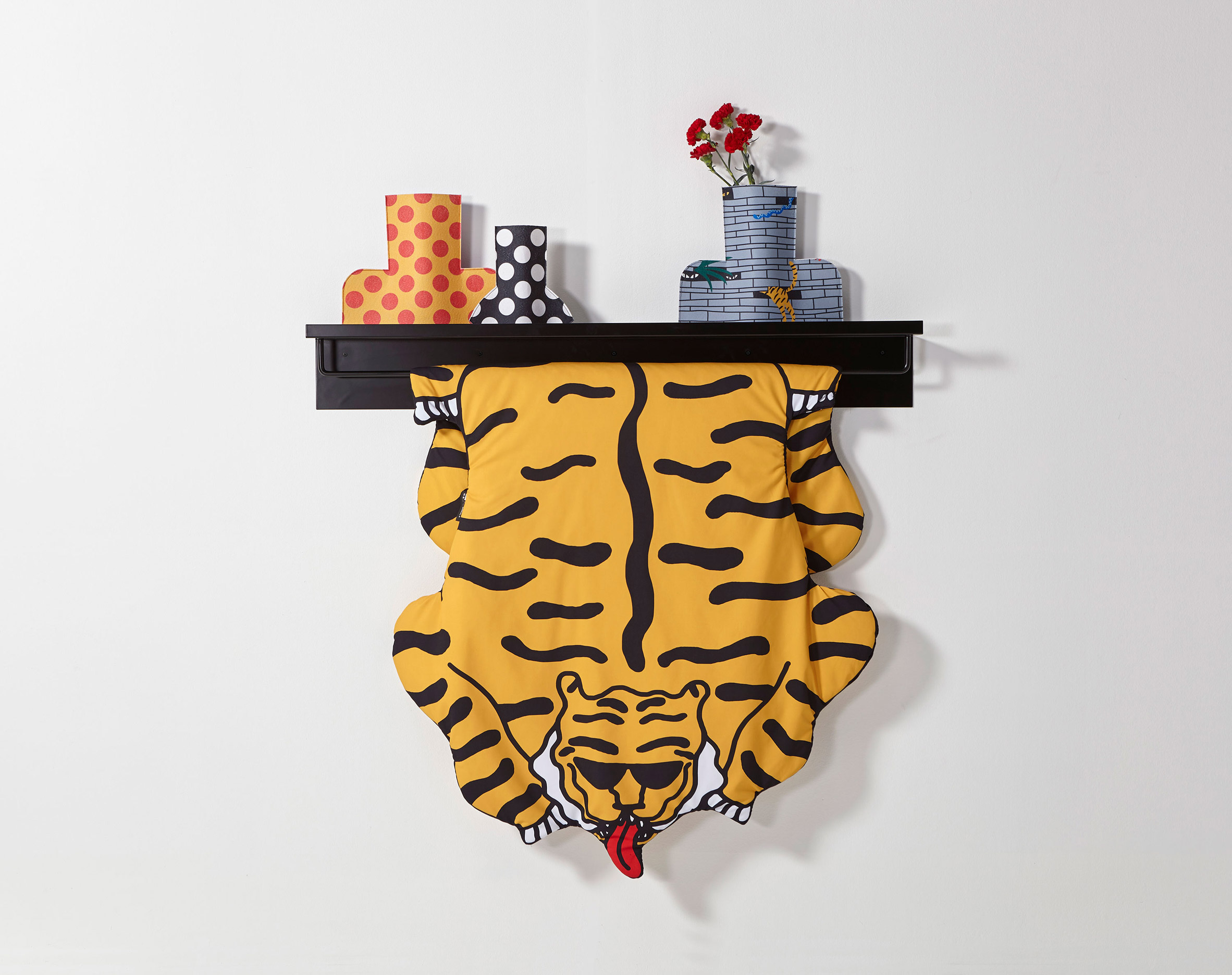 Egle Zvirblyte creates blankets for Sancal patterned with tigers and bananas