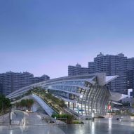 Arching rooftop walkway and garden tops West Kowloon Station in Hong Kong