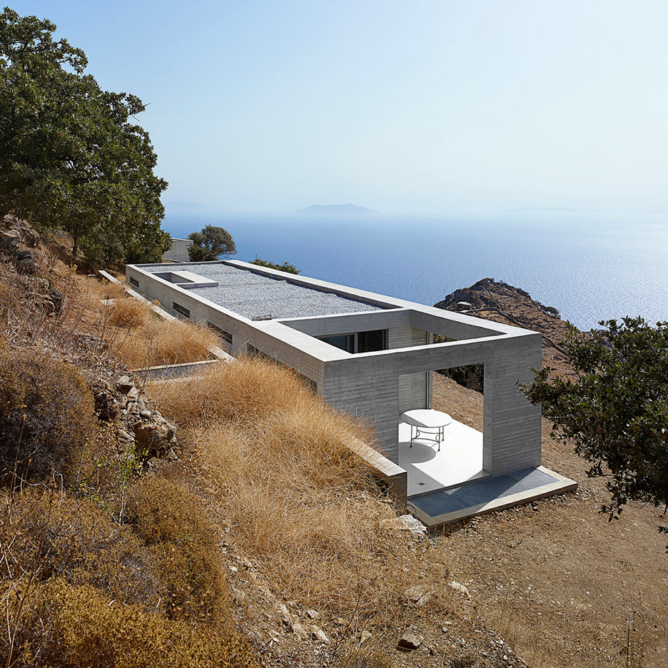 En Route Architects perches linear concrete house on Greek island hillside