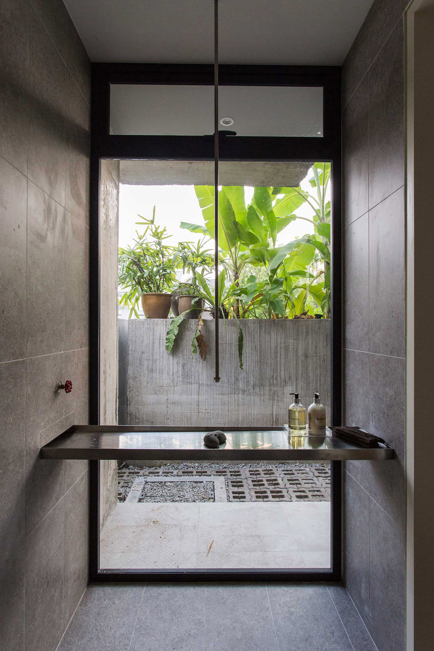 Bathroom of Planter Box House in Kuala Lumpur by Formzero