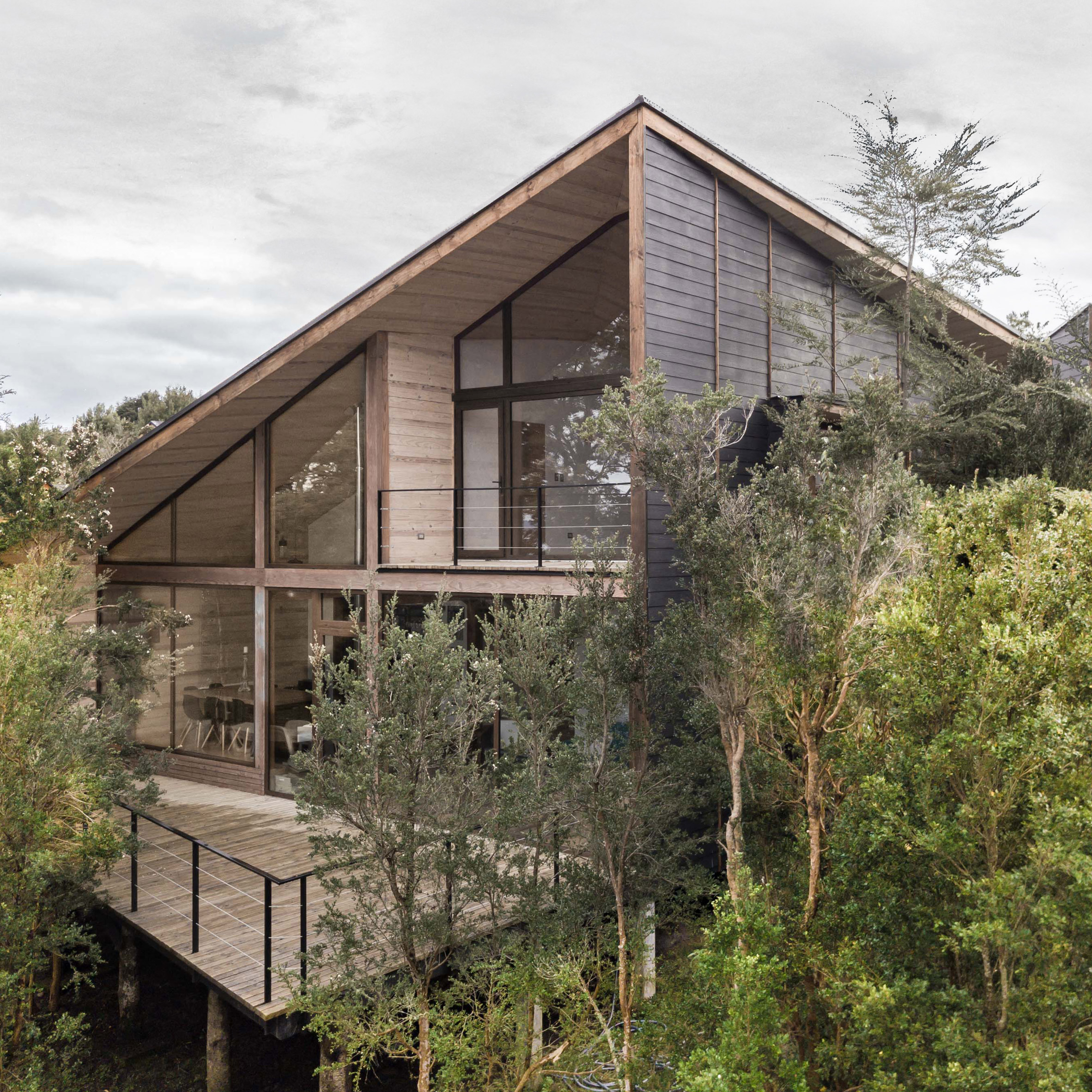 Chilean lakeside Split House is divided into spaces for children and adults