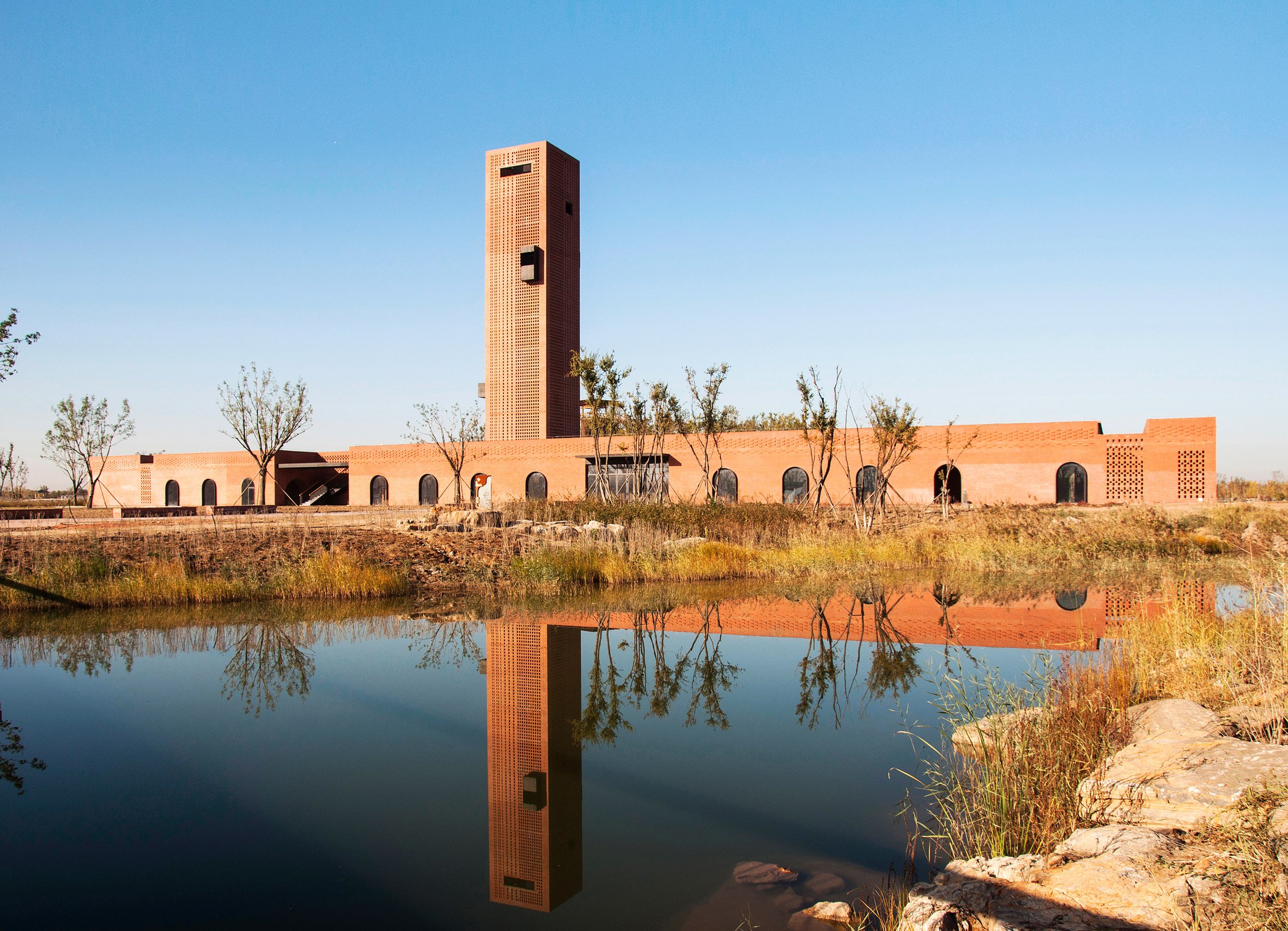 Interval Architects uses red brick for botanic art centre in a wetland park