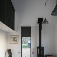 Interiors of Eastabrook Architects's corrugated metal house extension