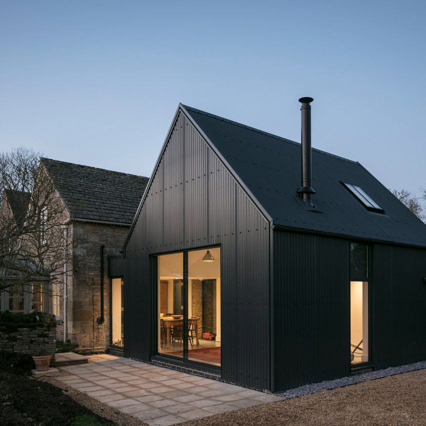 Eastabrook Architects adds corrugated metal extension to Cotswolds cottage