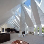 Craftworks inserts home with faceted modern gothic roof into abandoned chapel