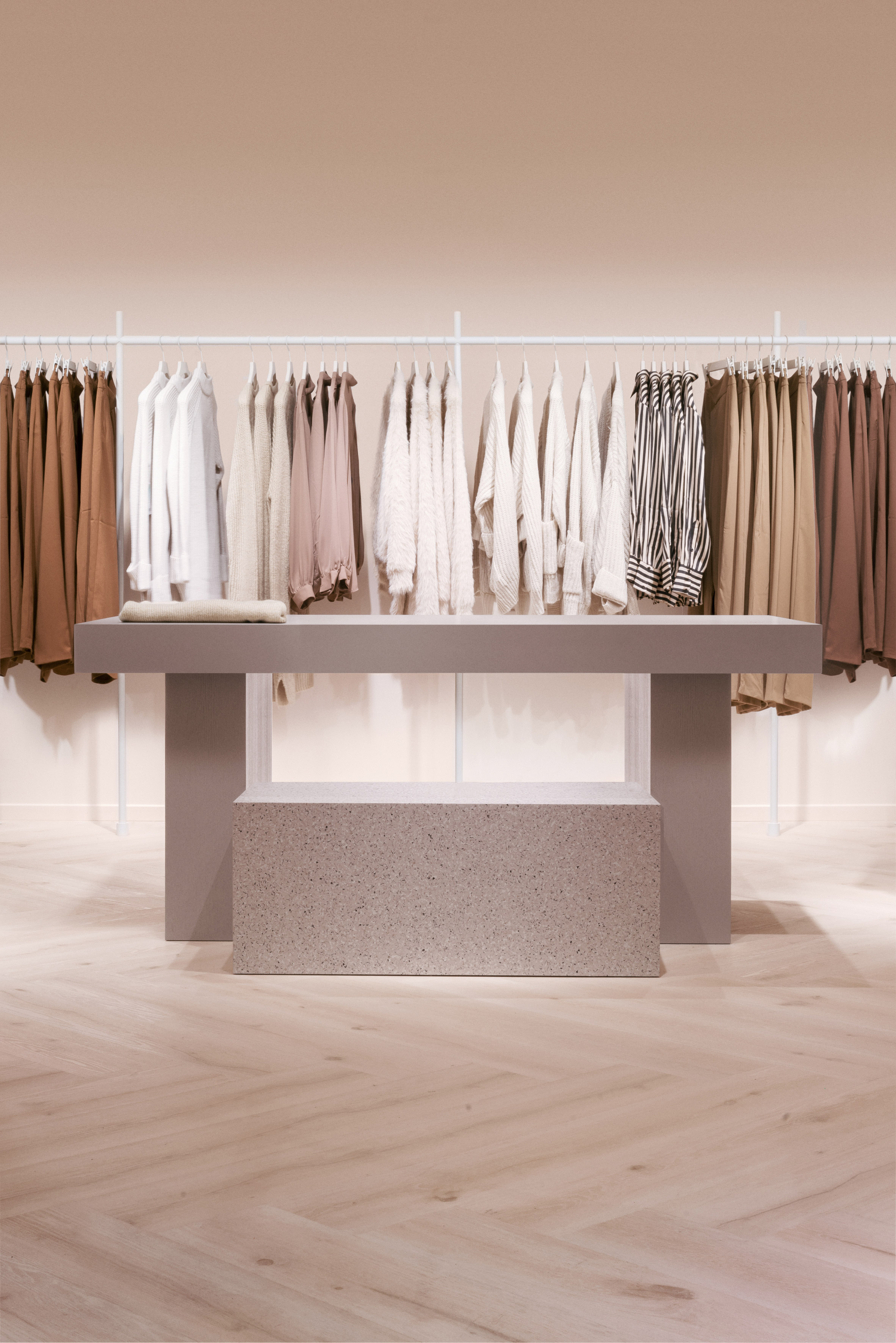 Gina Tricot store in Stockholm combines a medley of materials with pink  walls