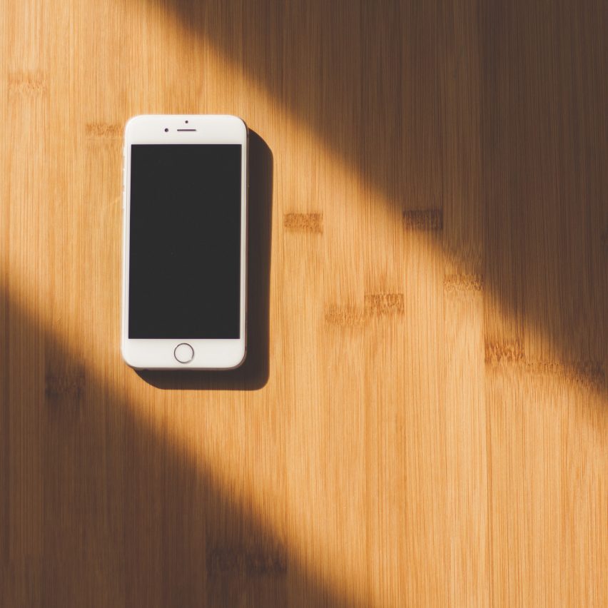 iPhone on a table, photo courtesy of Pixabay