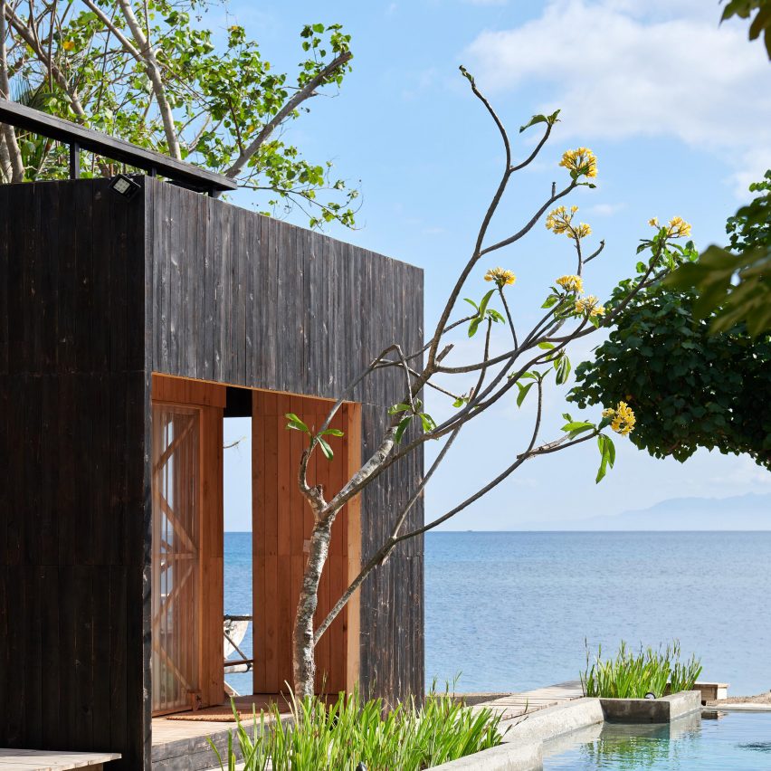Atelier Riri creates charred teak cabins at Kiyakabin resort in Indonesia