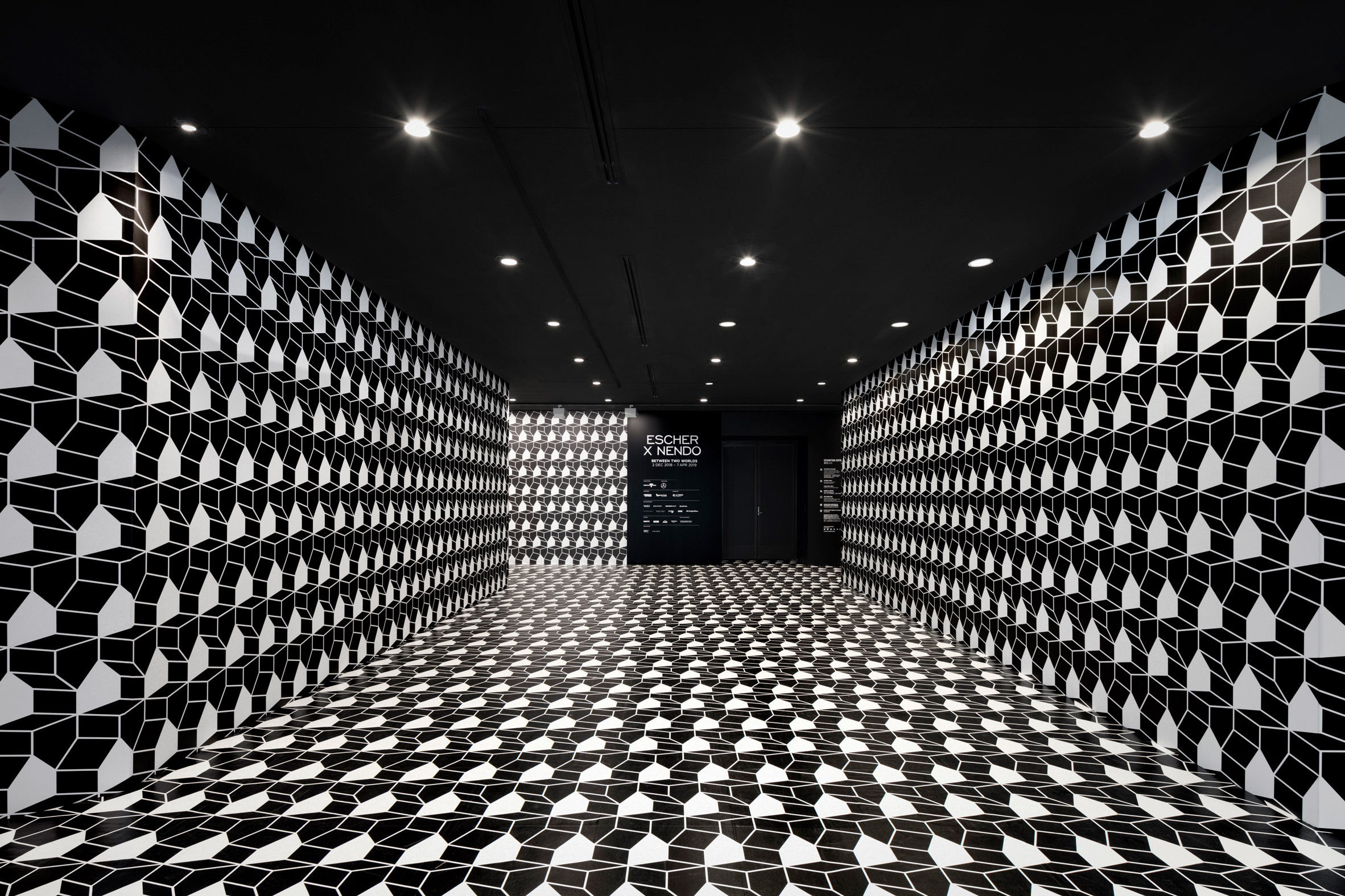 Oki Sato of Nendo has designed an exhibition of M.C. Escher's work at the National Gallery of Victoria in Melbourne.