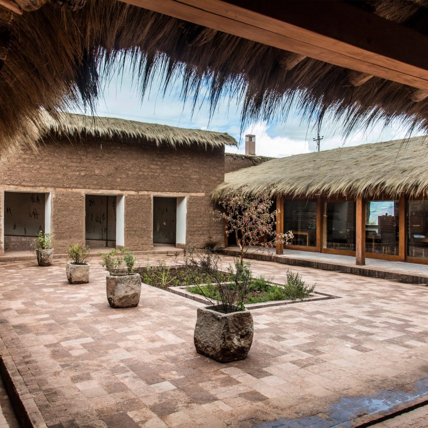 Fraying grass roof tops Mil Centro restaurant in Peru's historical Sacred Valley