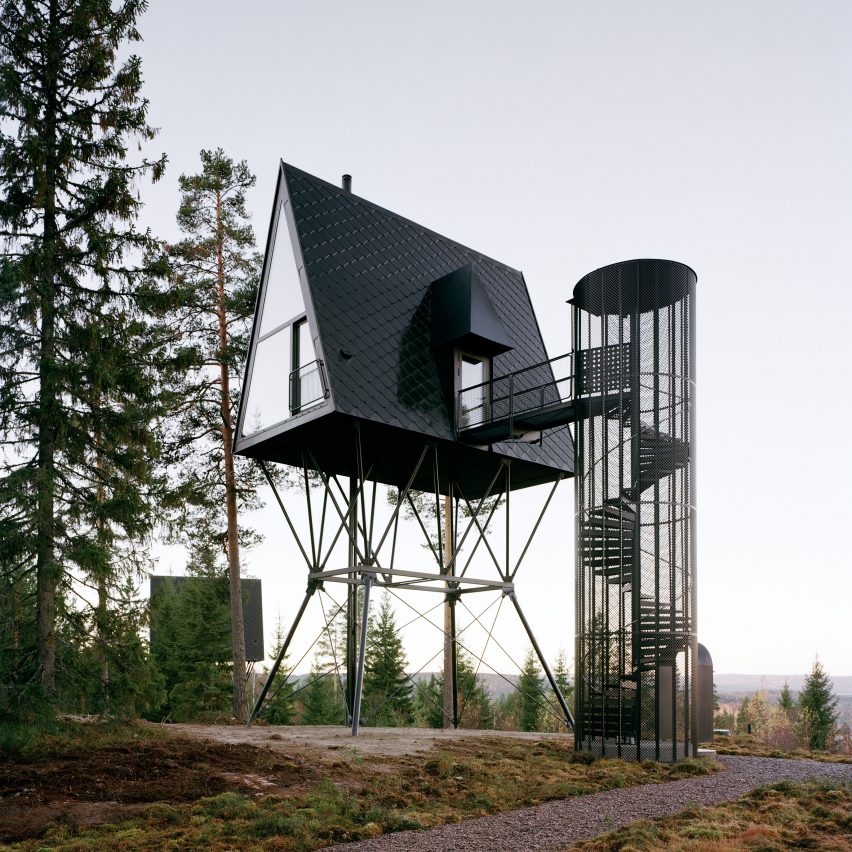 Espen Surnevik elevates pair of treetop cabins on stilts in Norwegian forest
