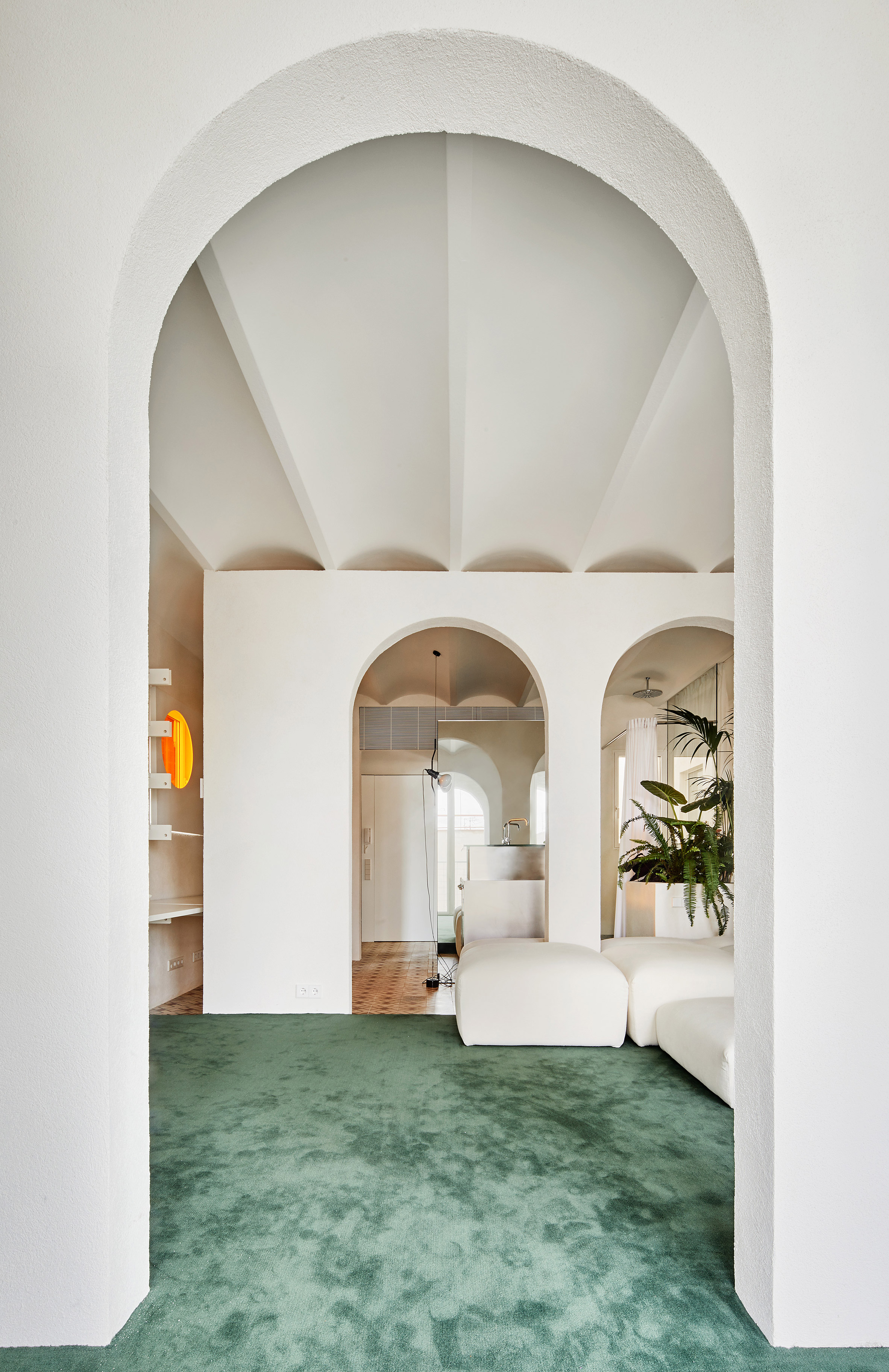 Arched openings in interiors of penthouse apartment designed by PMAA