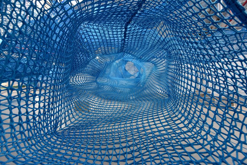 Anya Hindmarch and Numen/For Use create woven network of blue tunnels at London Fashion Week