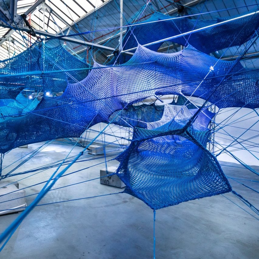 Anya Hindmarch and Numen/For Use create woven blue tunnels at London Fashion Week