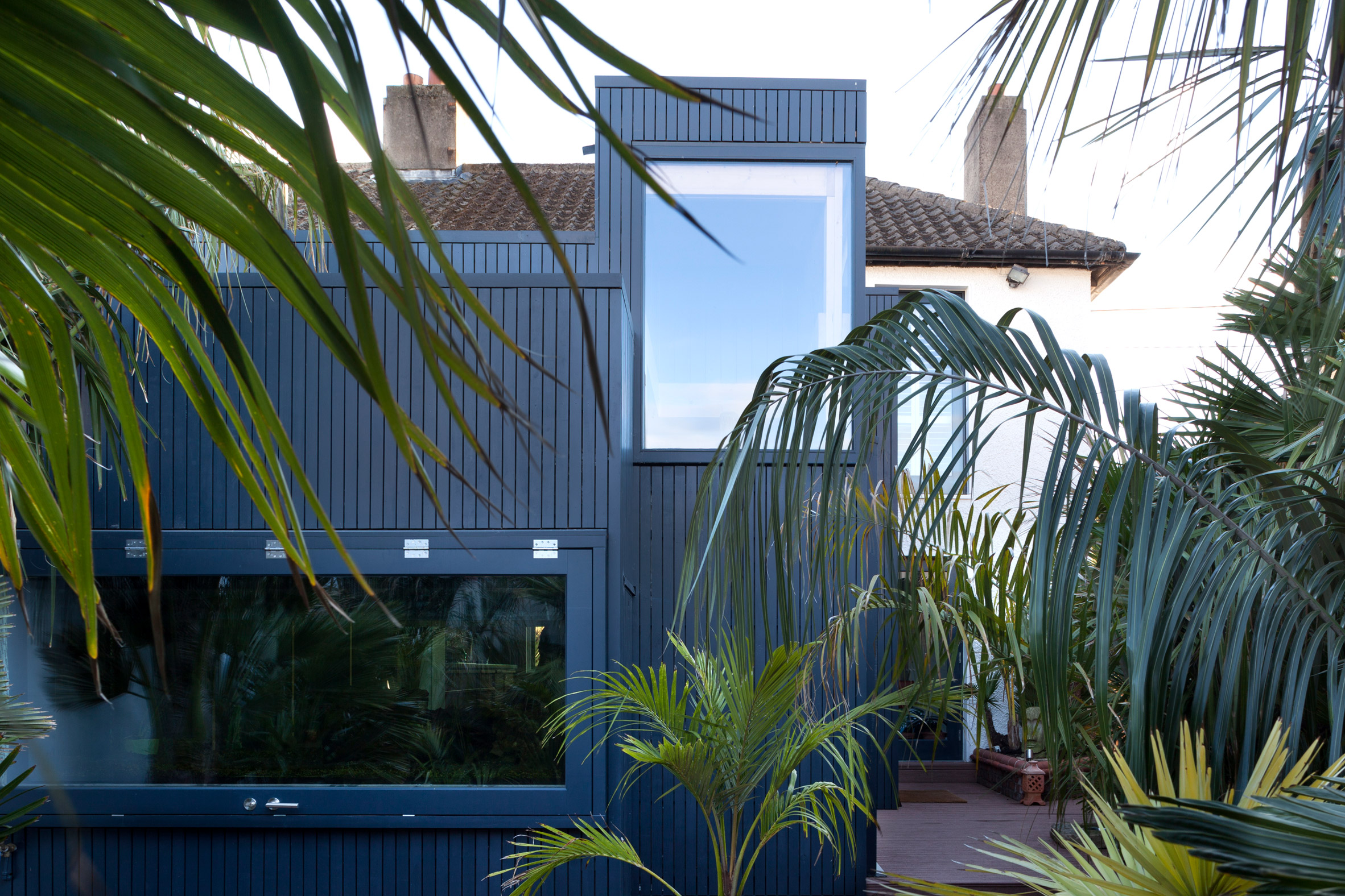 House in a Palm Garden by TAKA