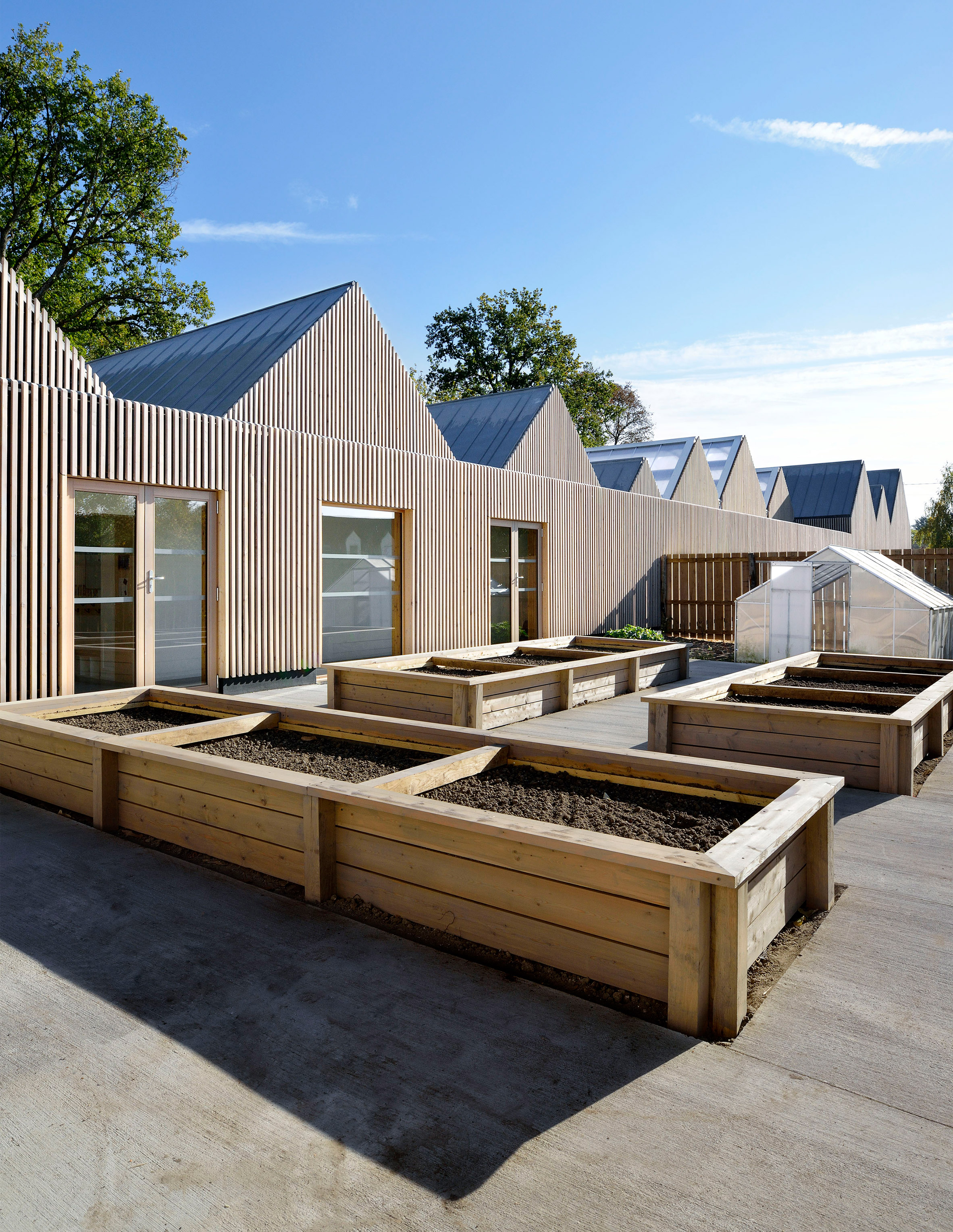 Tracks Architectes Designs Timber Clad Gabled Kindergarten La Ruche