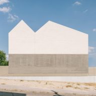 Steyn Studio's concrete and travertine Sierra House has a mountain-shaped roof