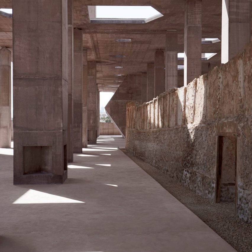 Valerio Olgiati creates huge red concrete canopy at entrance to Bahrain's Pearling Path