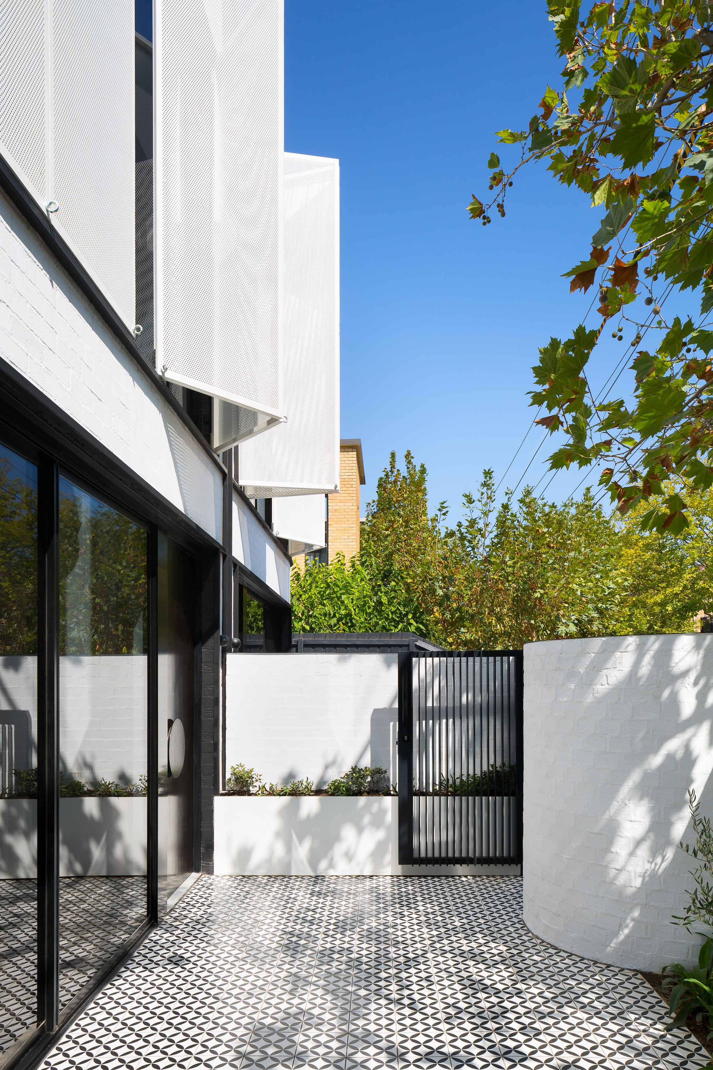 Exterior of Pine Ave townhouses by Cera Stribley Architects and The Stella Collective