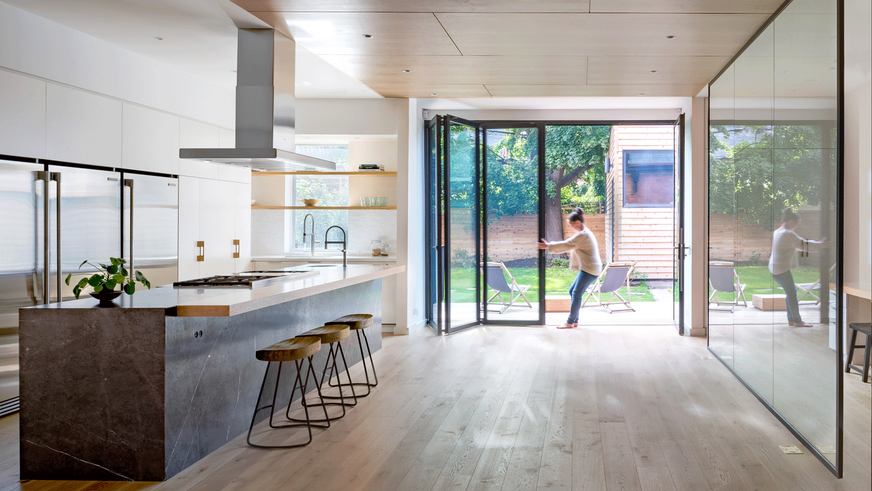 Ten interiors by architects that use internal glazing to create ...