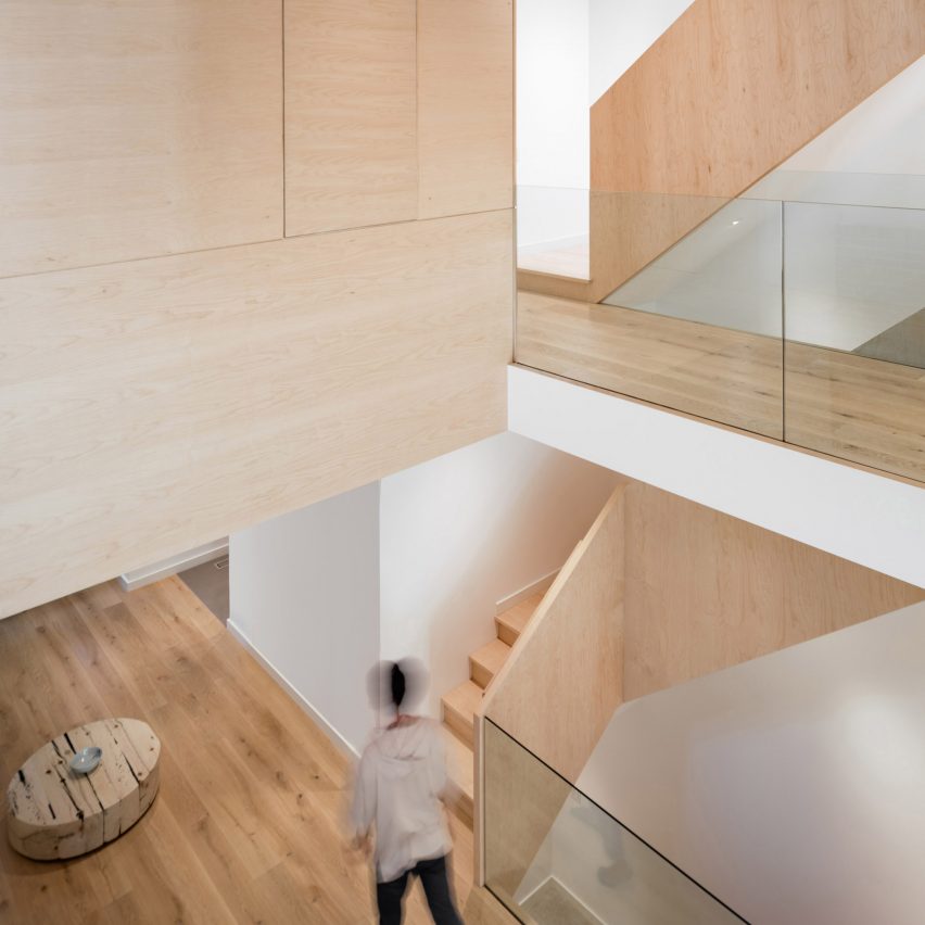 StudioAC inserts wooden staircase and bedroom boxes into 140-year-old Toronto home