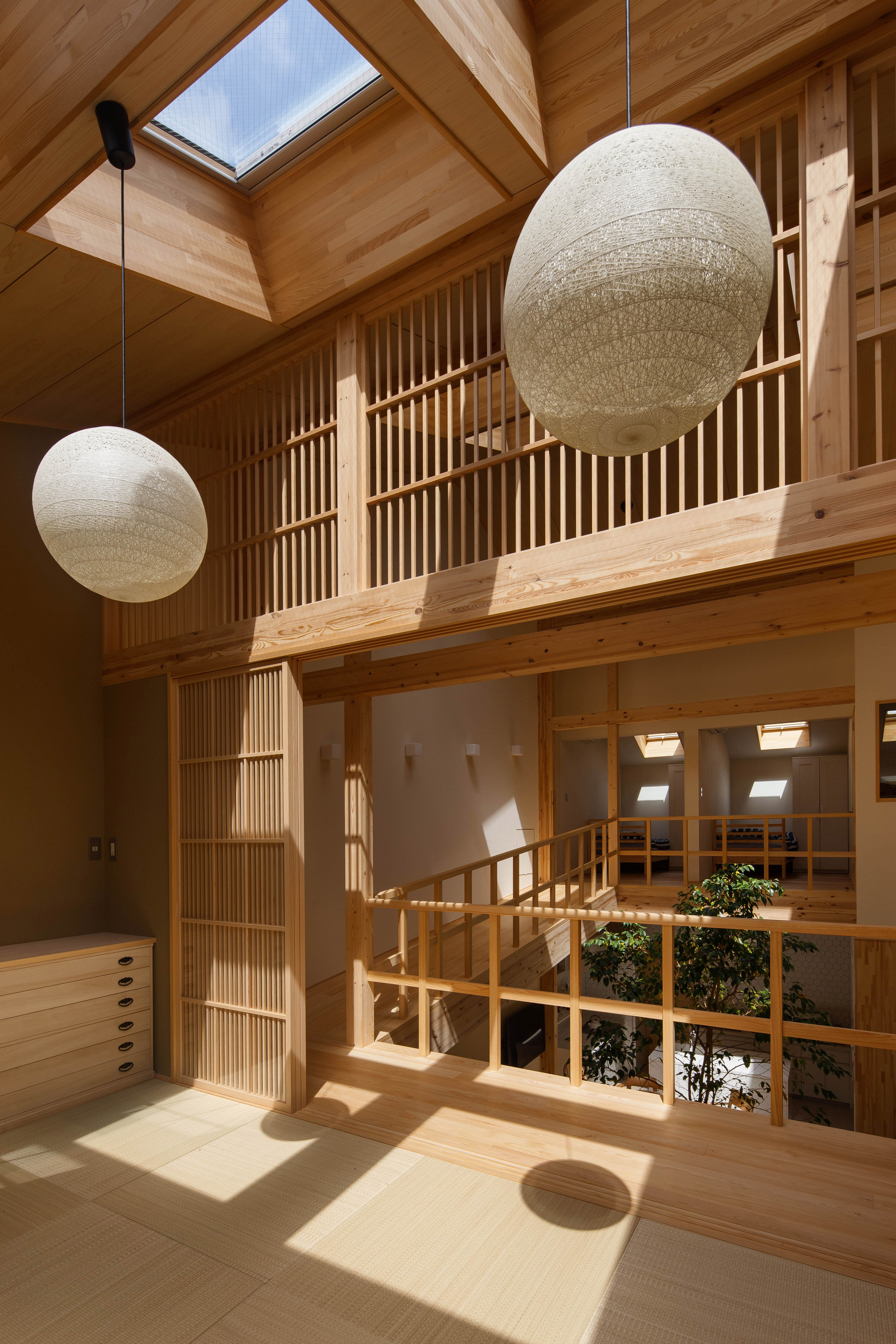07Beach arrange Kyoto home around glass-fronted bathroom