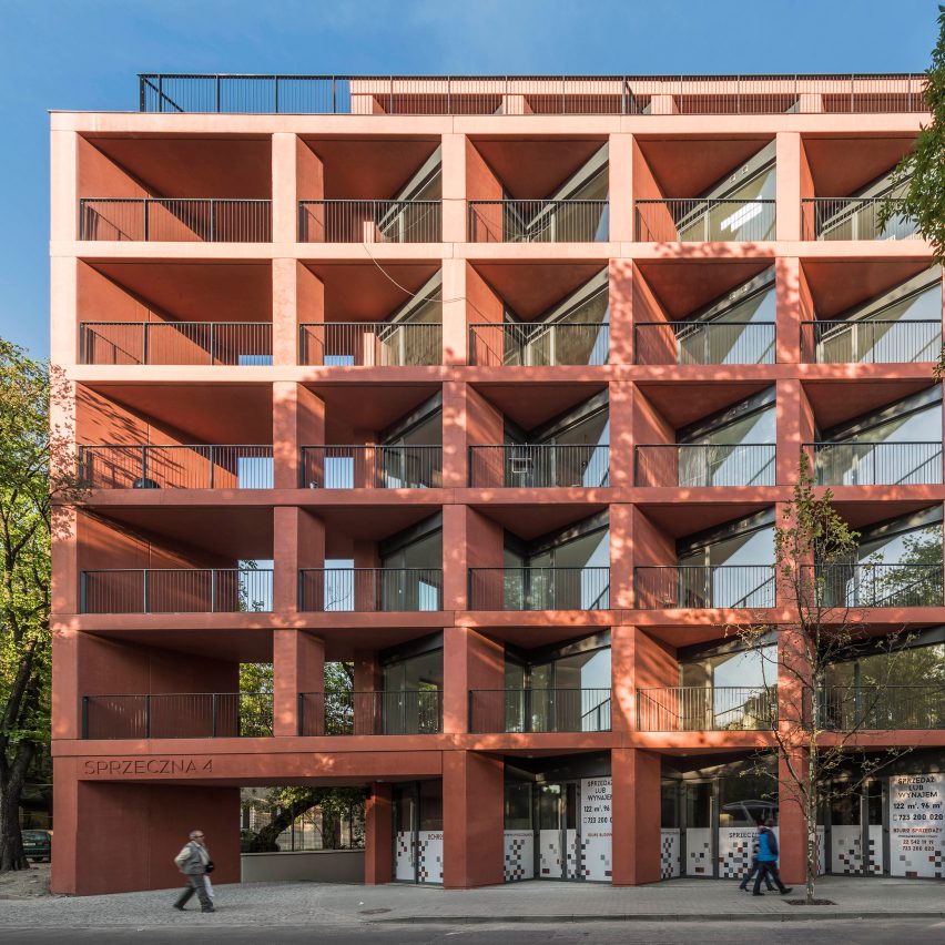 BBGK explores potential of prefabrication with red concrete housing block in Poland