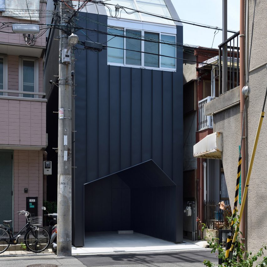 Geneto raises skinny house in Japan above pentagonal garage hole