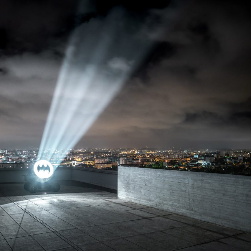 Bat Signal by Alex Israel on roof of Le Corbusier's Cite Radieuse in Marseille