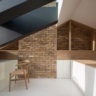 ConForm Architects opens up loft with a glass and steel dormer
