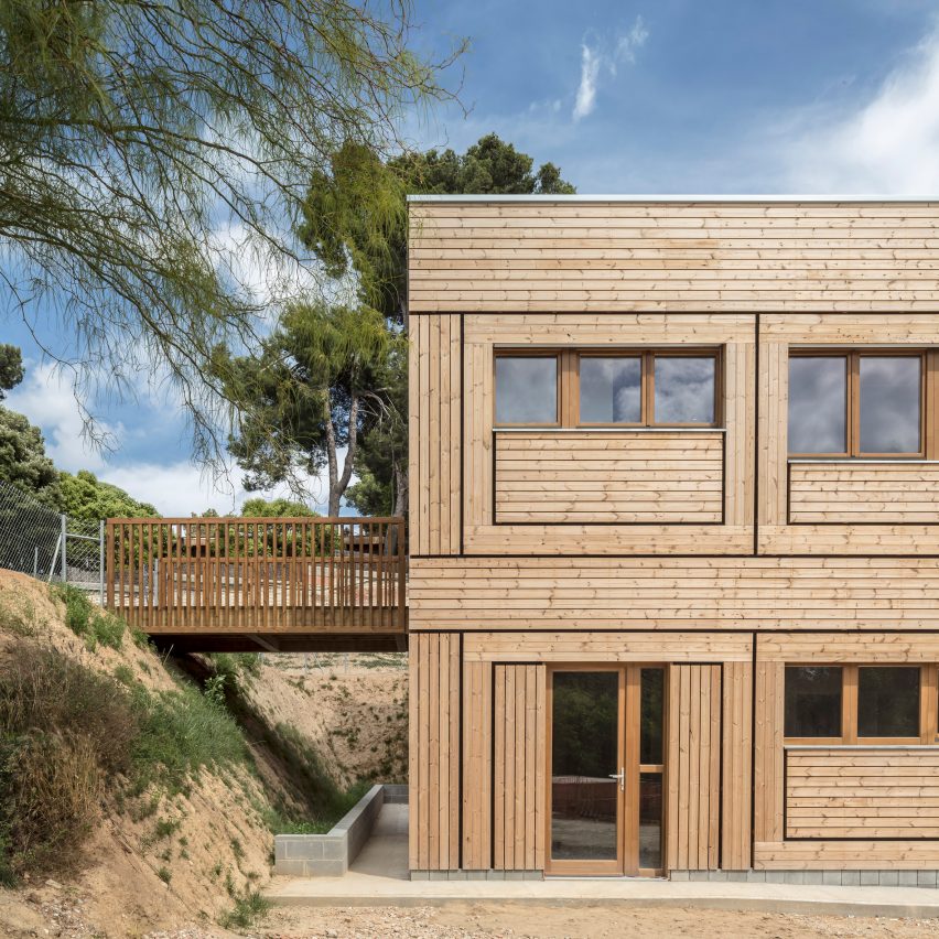 Prefabricated pine panels clad kindergarten near Barcelona