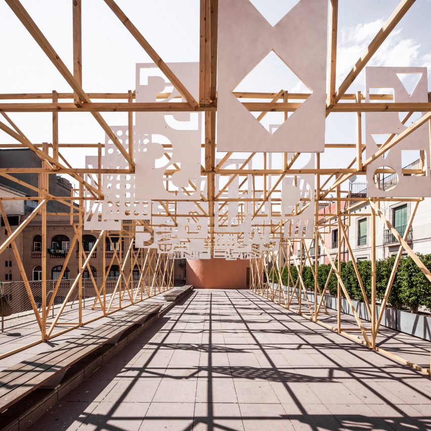 Anthony Burrill's graphics top delicate timber rooftop pavilion in Barcelona