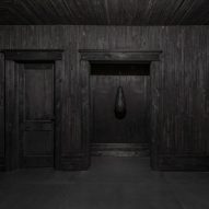 Anders Ruhwald converts abandoned Detroit building into all-black installation