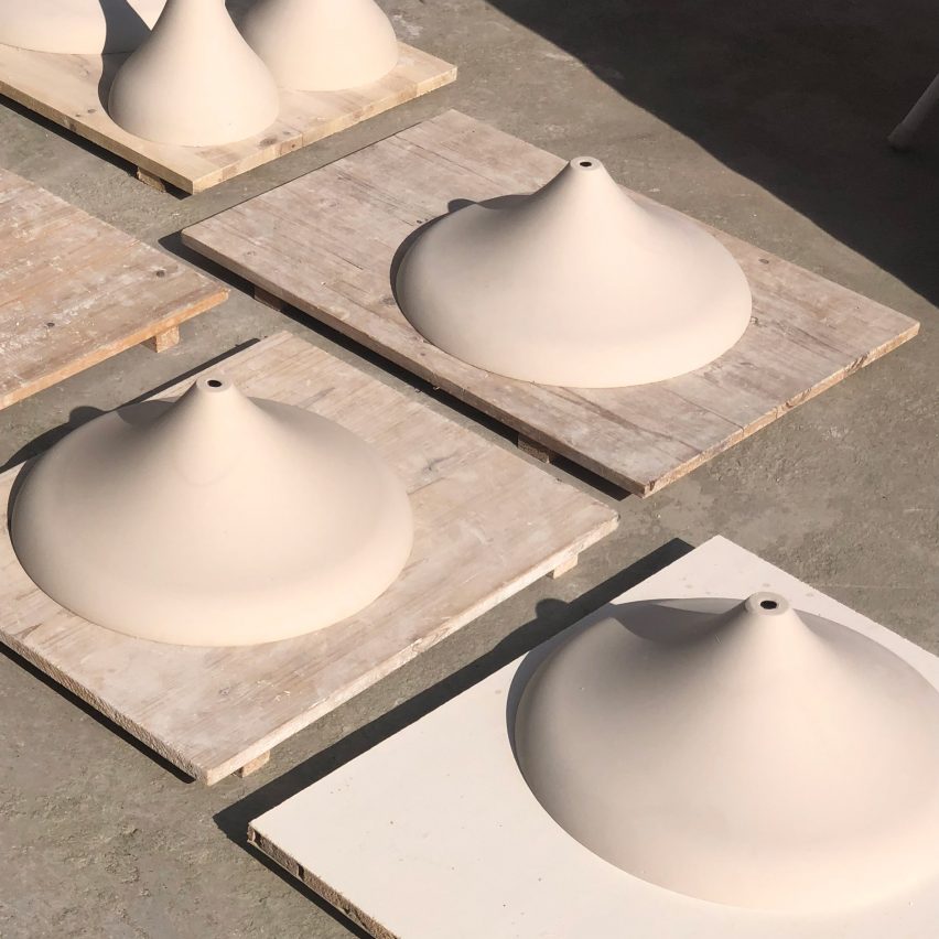 The ceramic pendant lamps are fired for a first time in a kiln