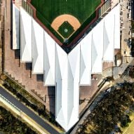 Angular white roof covers Mexico City baseball stadium by FGP Atelier and Taller ADG