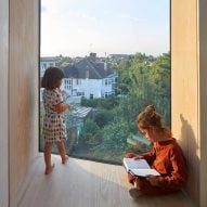 Rise Design Studio adds Douglas fir-lined reading nooks to London house