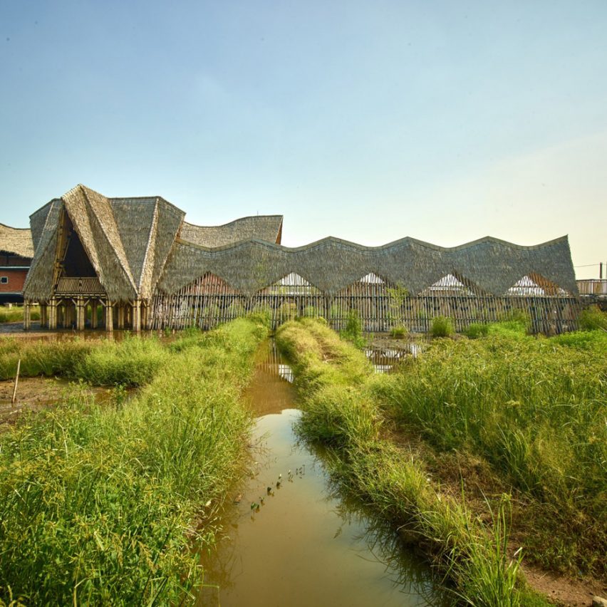 Zigzag thatched bamboo roofs shade classrooms of school in Indonesia