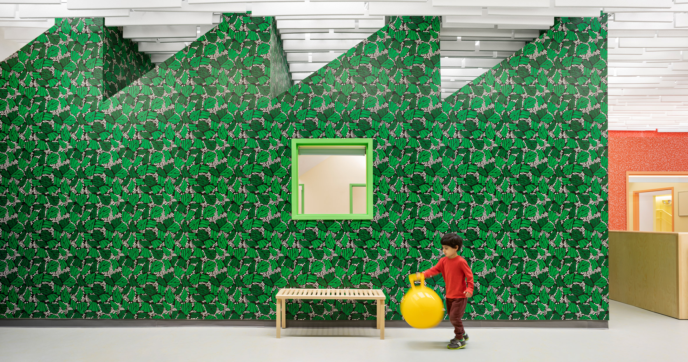 Green wallpaper inside SolBe Learning Centre by Supernormal