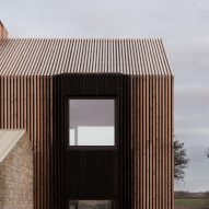 Bureau de Change covers barn-style Cotswolds house with ombré effect charred larch