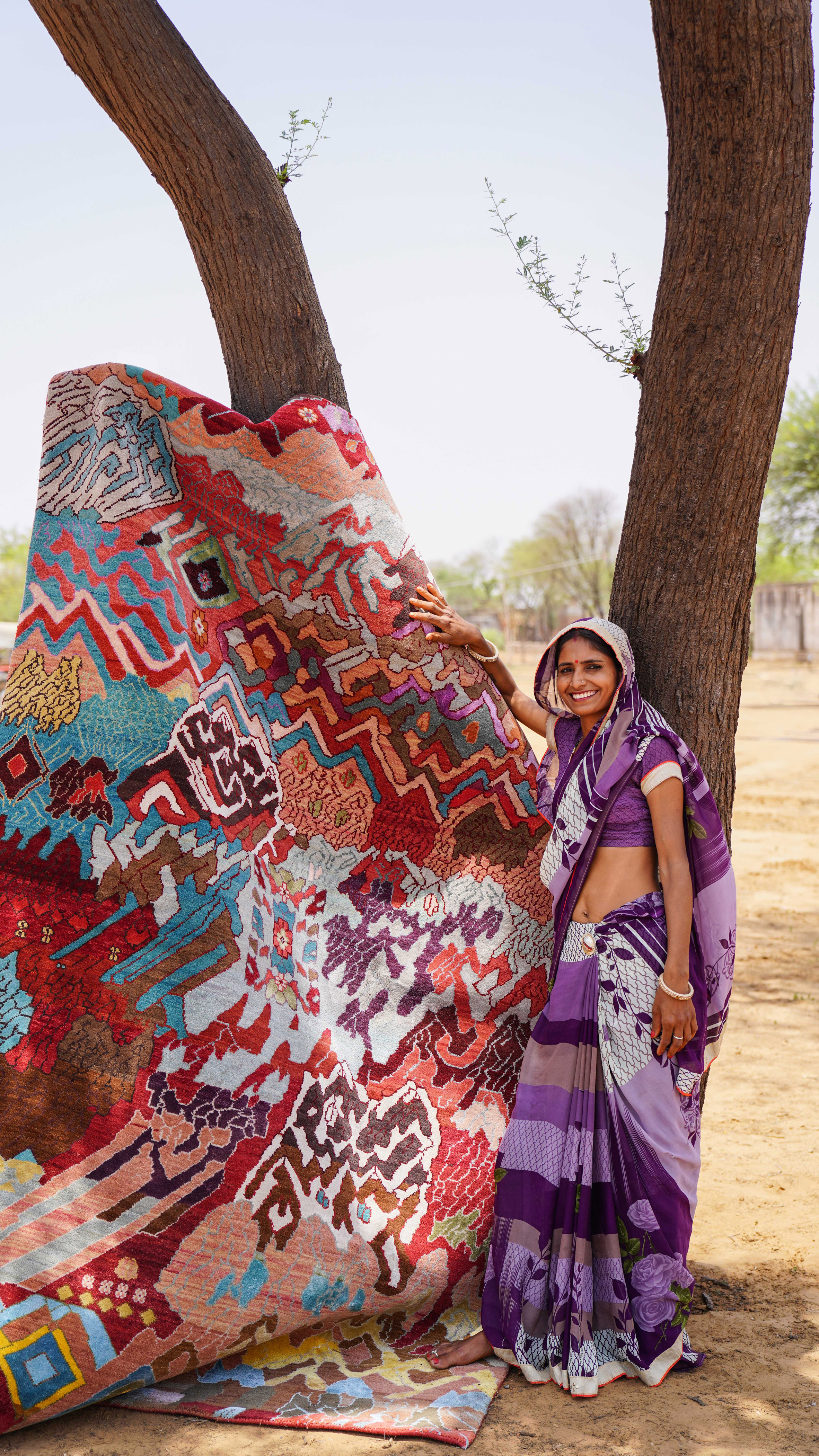 Manju Devi's abstract Aas Pass rug is inspired by rural village life