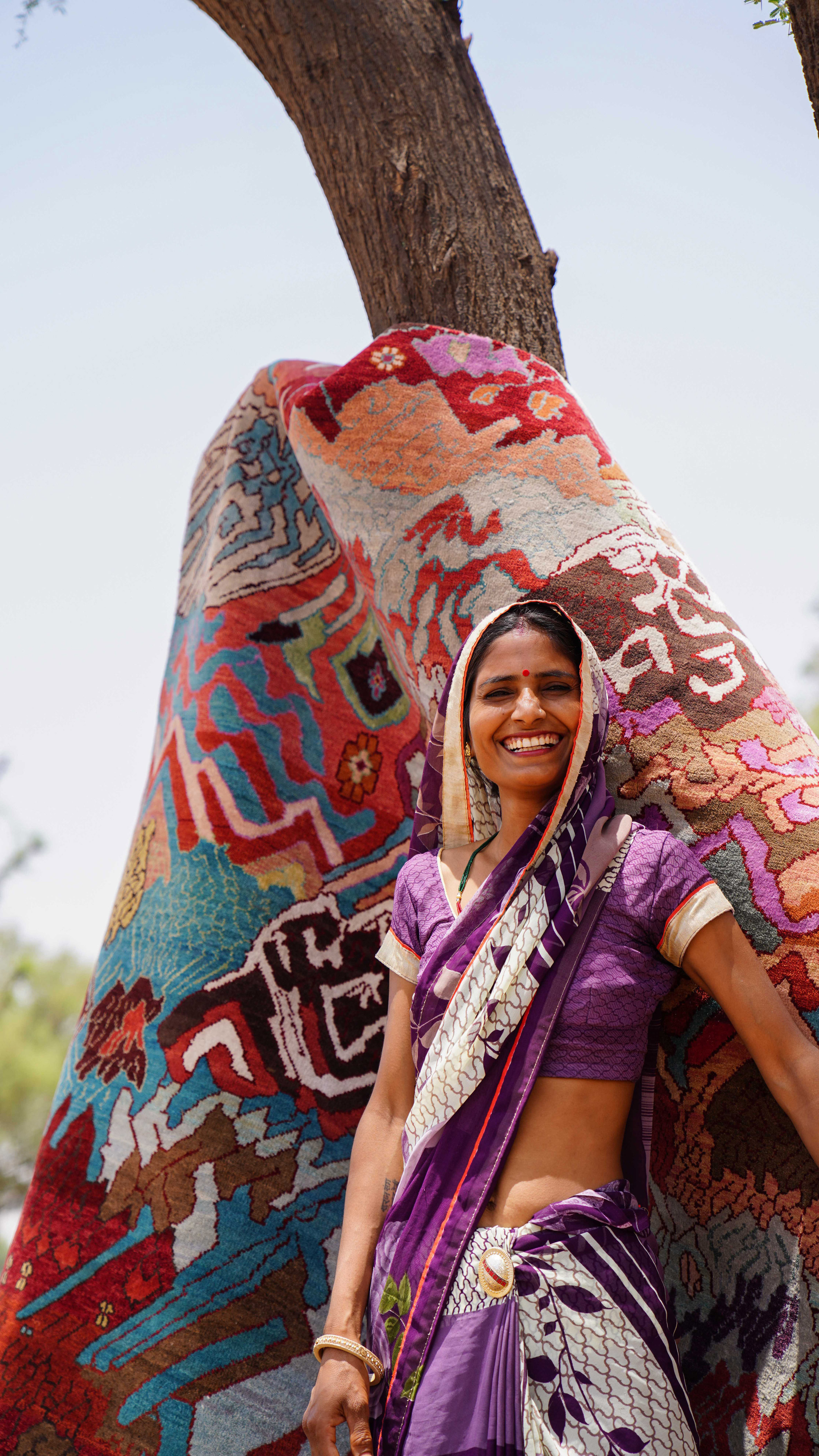 Manju Devi's abstract Aas Pass rug is inspired by rural village life